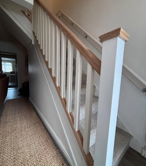 Wooden bannister and handrail installation in Wales